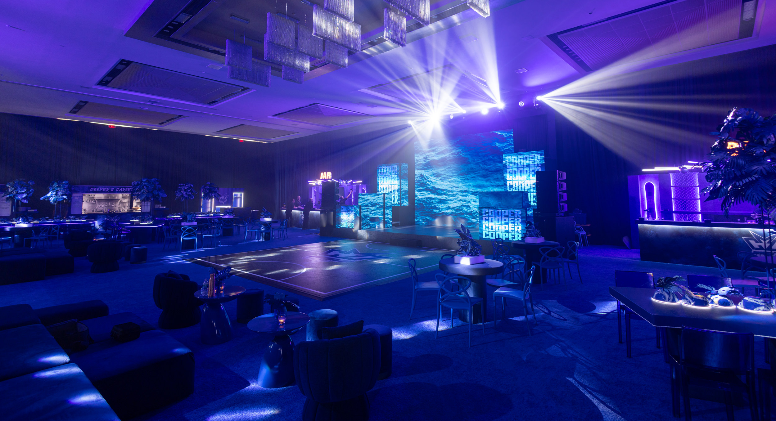 Luxury event production featuring custom staging, lighting, and an immersive guest experience