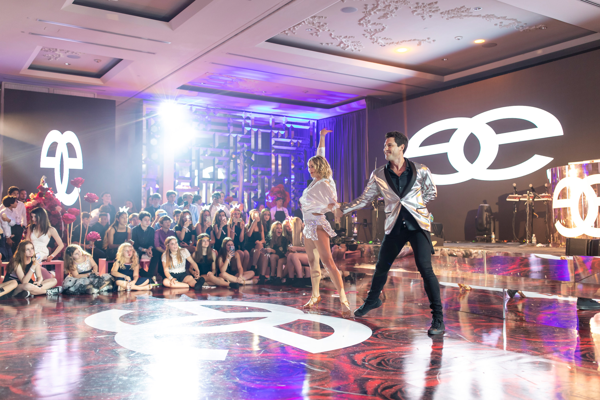 Professional dancers performing during a luxury Miami bar mitzvah celebration
